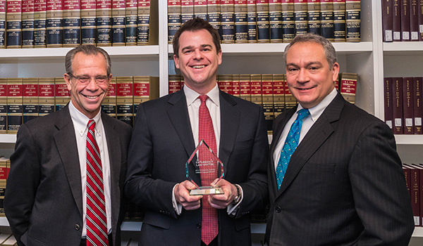 Photo of Clifford Chance with Award