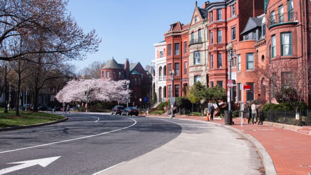 Photo of DC street with arrow pointing forward