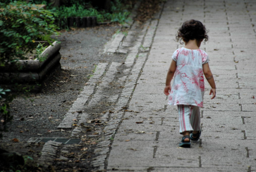 Photo of toddler walking.