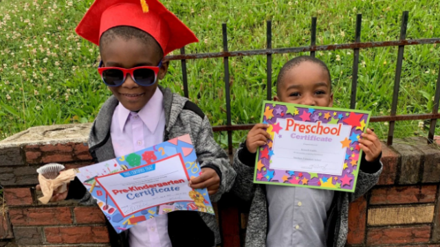 Photo of Kenneth and Emmanuel graduating preschool