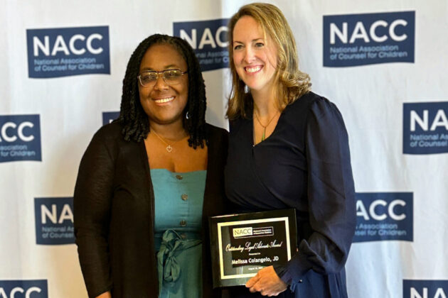 Chief Legal Officer LaShanda Adams stands next to Appellate Director Melissa Colangelo after Melissa receives NACC National Outstanding Legal Advocate Award.