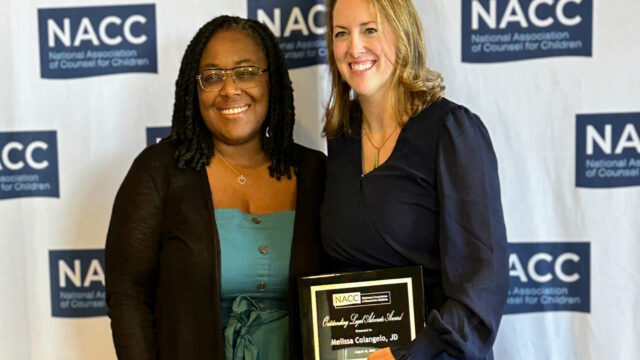 Chief Legal Officer LaShanda Adams stands next to Appellate Director Melissa Colangelo after Melissa receives NACC National Outstanding Legal Advocate Award