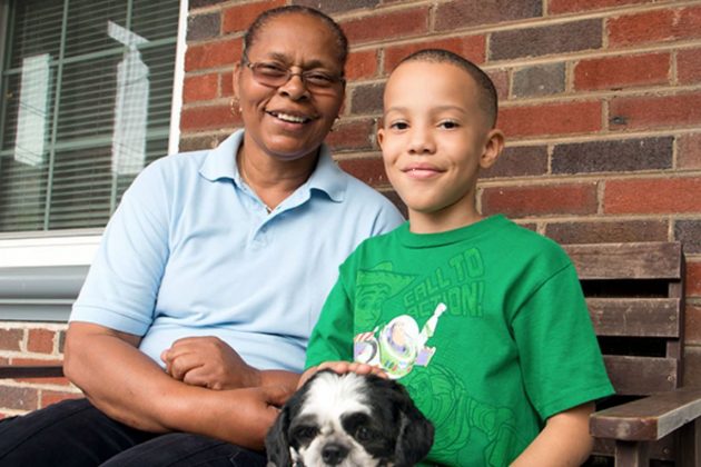 Phyllis, Jordan and their dog, Sidney.