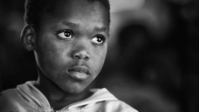 Close-up photo of a Black child.
