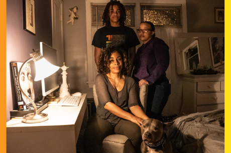 Photo of Williams family in bedroom.